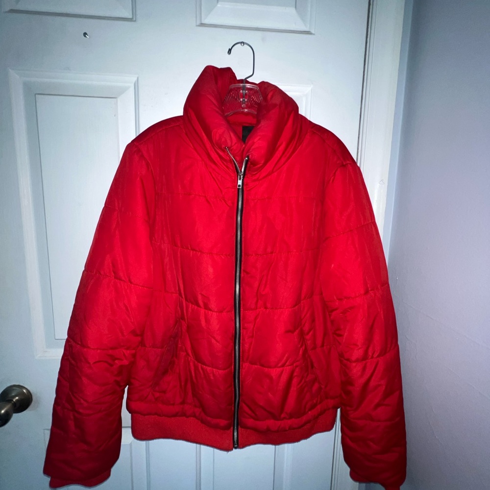Red puffer coat